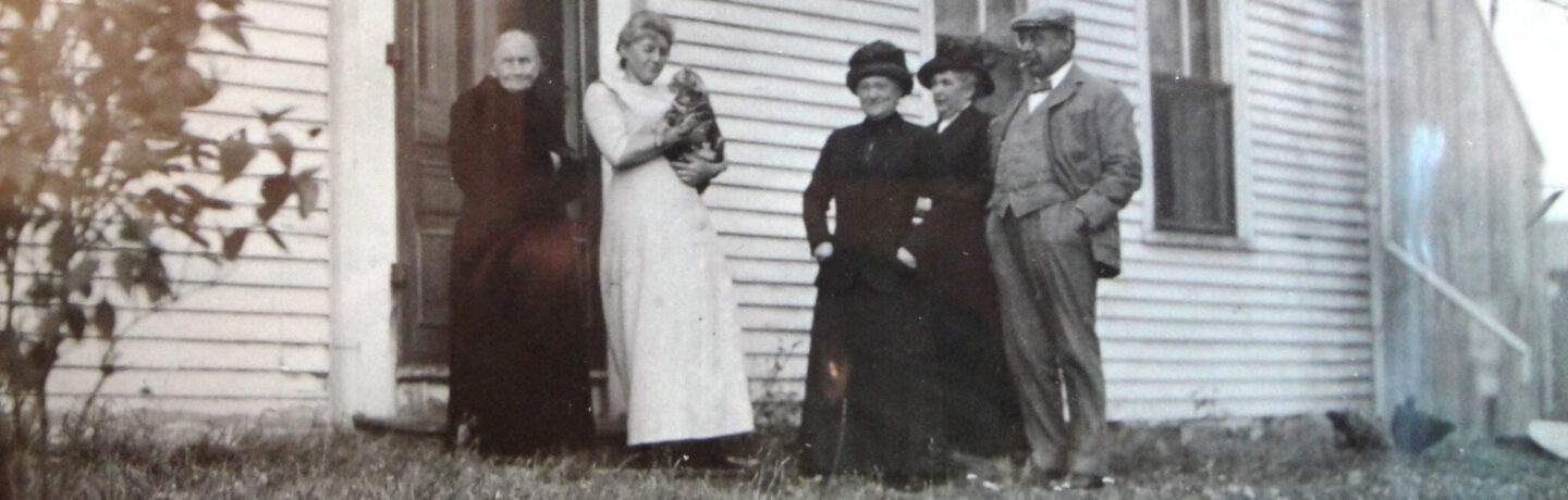 Shore dinner hall patrons in front of The Willows building